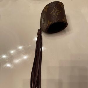 Louis Vuitton large bracelet with fringe.